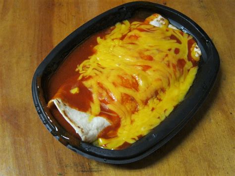 Taco Bell discontinued the Enchirito in 2013. The savory item consists of a soft flour tortilla loaded with beef, beans and onions. It's rolled up, coated in red sauce and topped with cheddar cheese. 